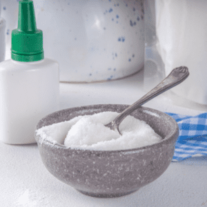 Sugar substitute allulose in a bowl with a spoon.